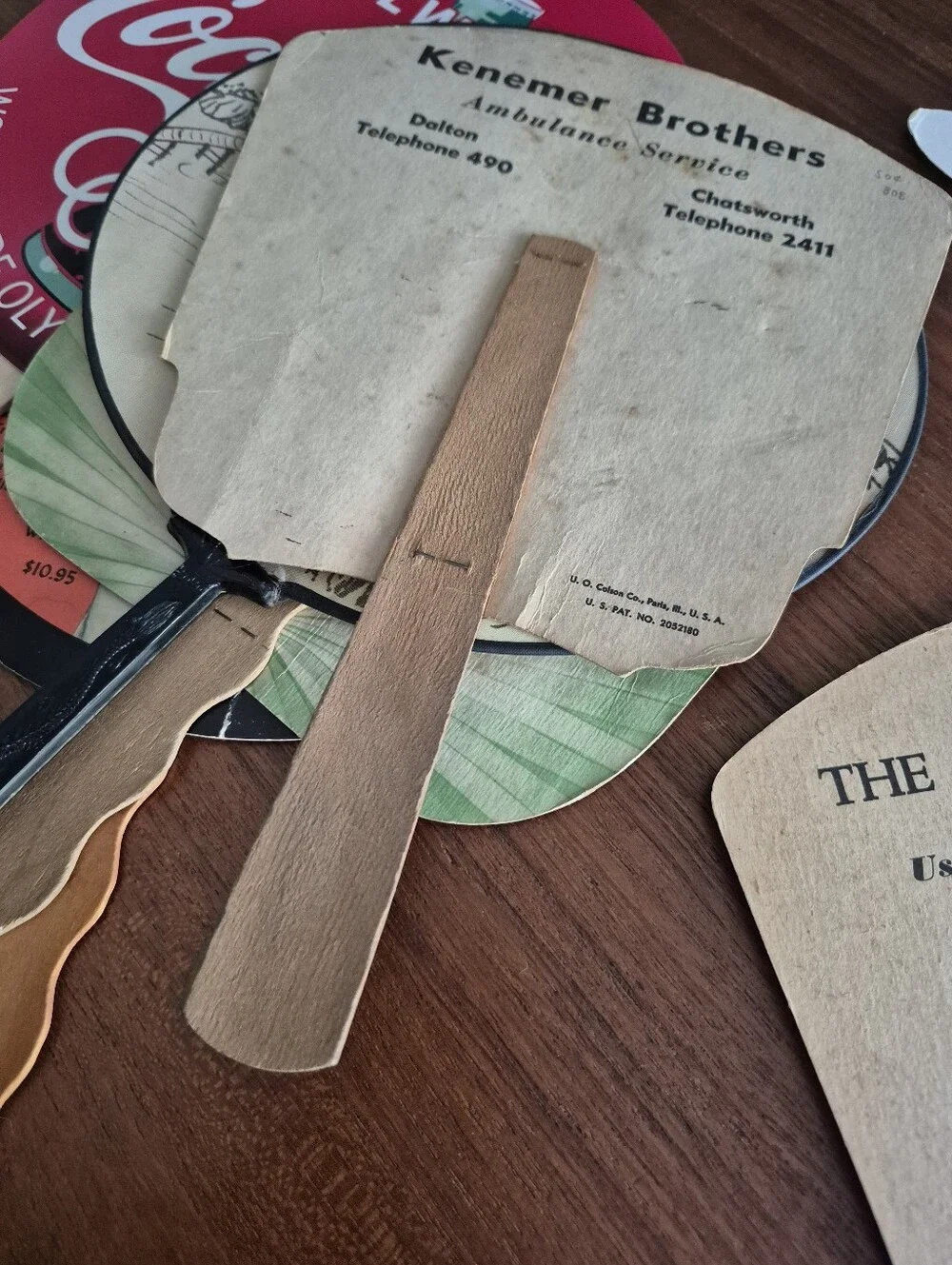 Assorted vintage advertising fans